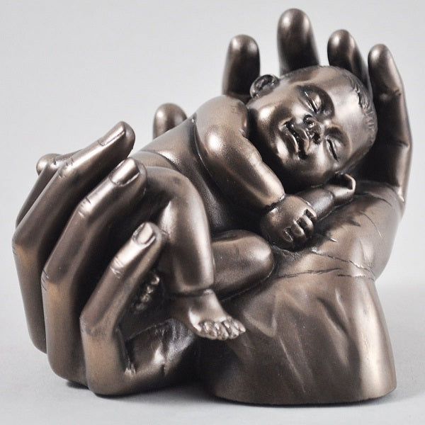 Bronze Baby Protected In Hands